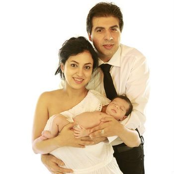 parents holding newborn