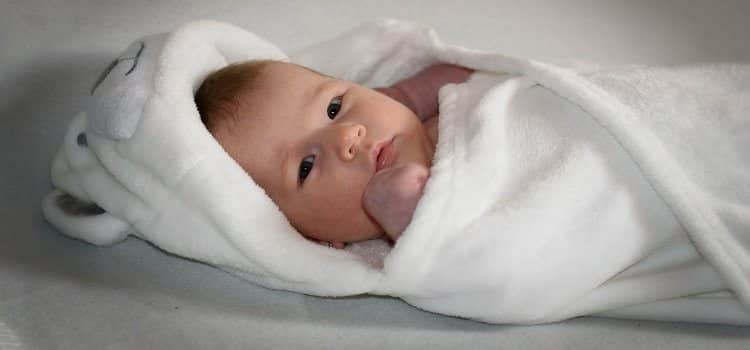 newborn girl in blanket