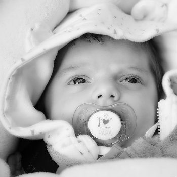 newborn with pacifier